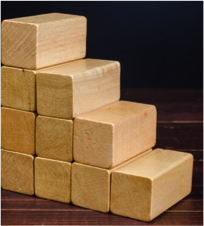 wooden blocks stacked like a staircase