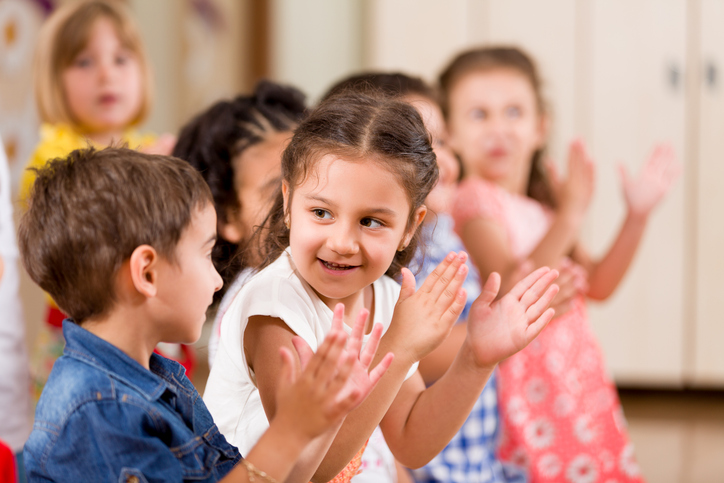 preschool children clapping